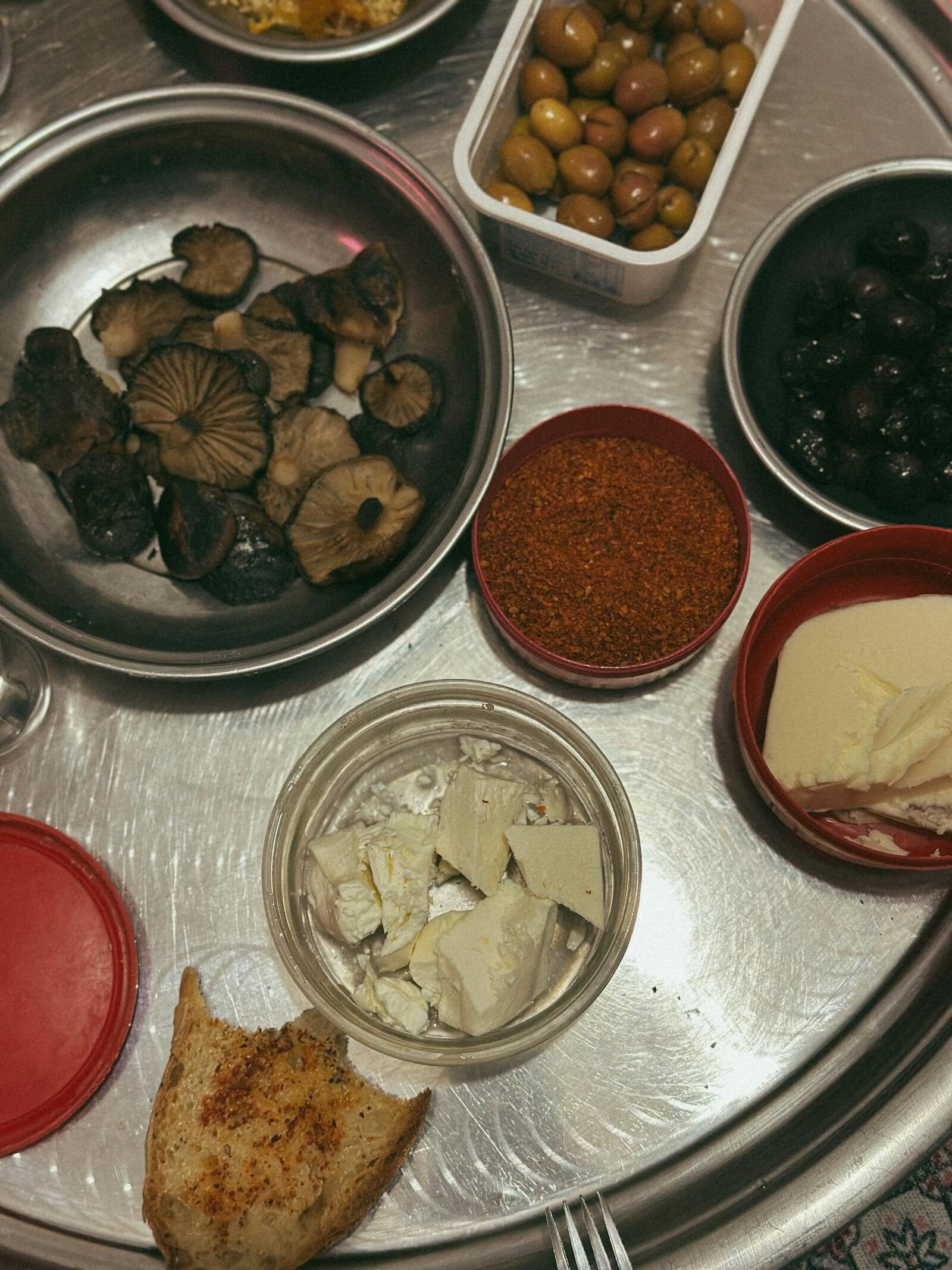 Moroccan-Mediterranean bread basket with hummus and olive dips