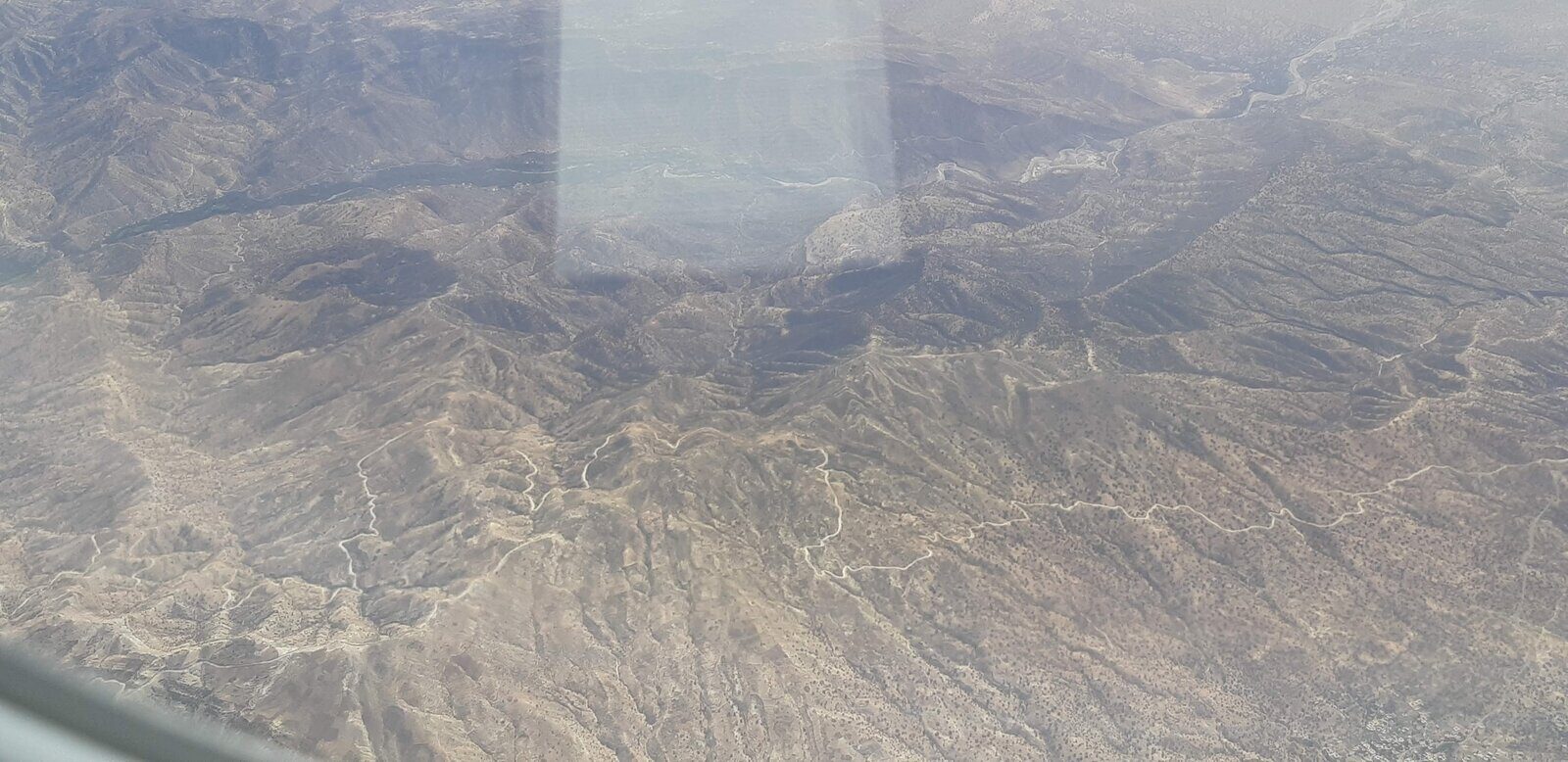 View from a plane window over the Atlas mountains on approach to Agadir