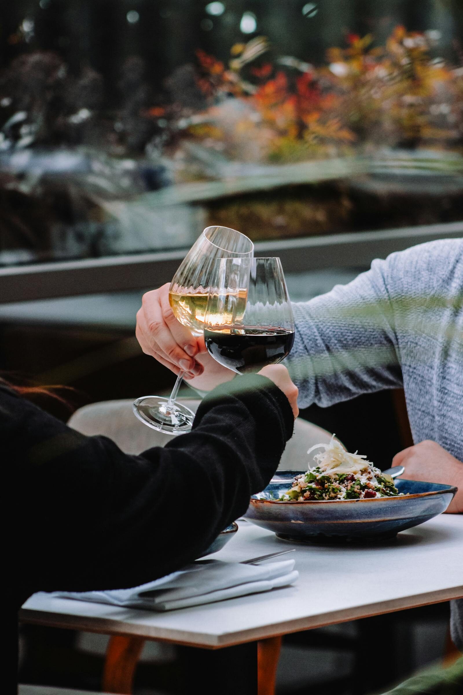 Couple dining at Les Blancs Agadir restaurant, candid documentary-style