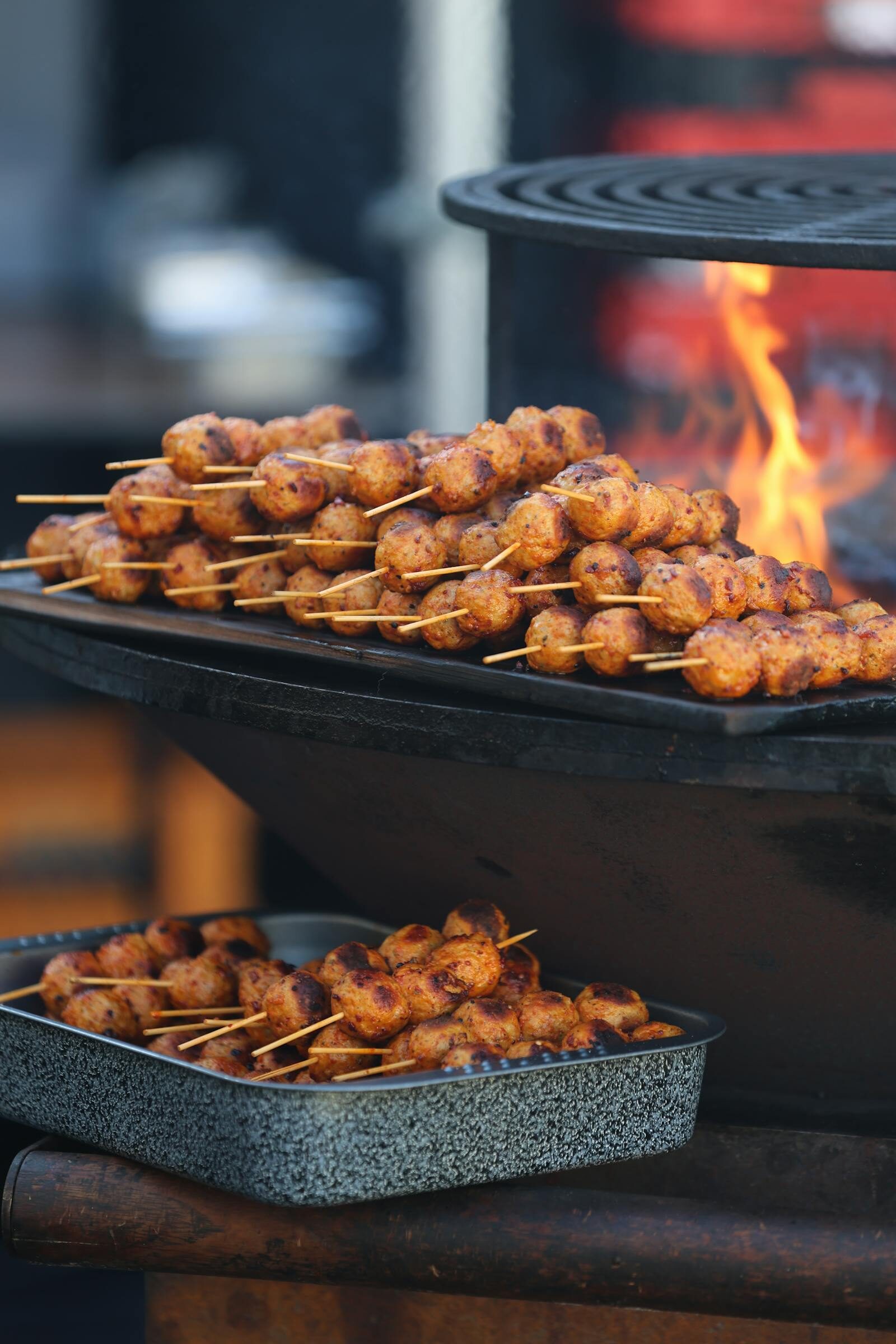 Moroccan grilled meat skewers and charred kefta brochettes served at Restaurant Rafiq Agadir