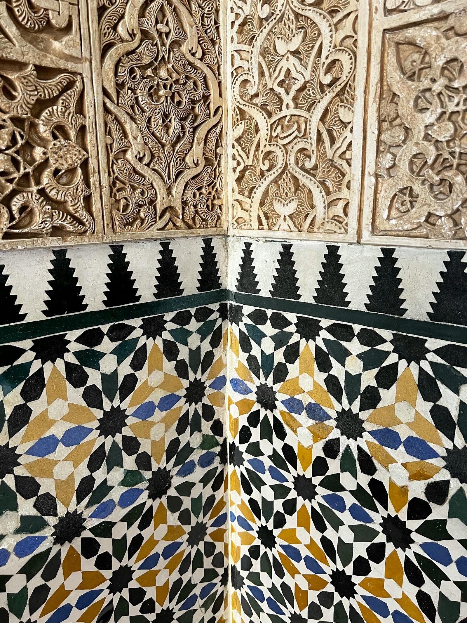 Moroccan restaurant interior with zellige tiles, hanging lamps and low tables in the Agadir style around Restaurant Rafiq