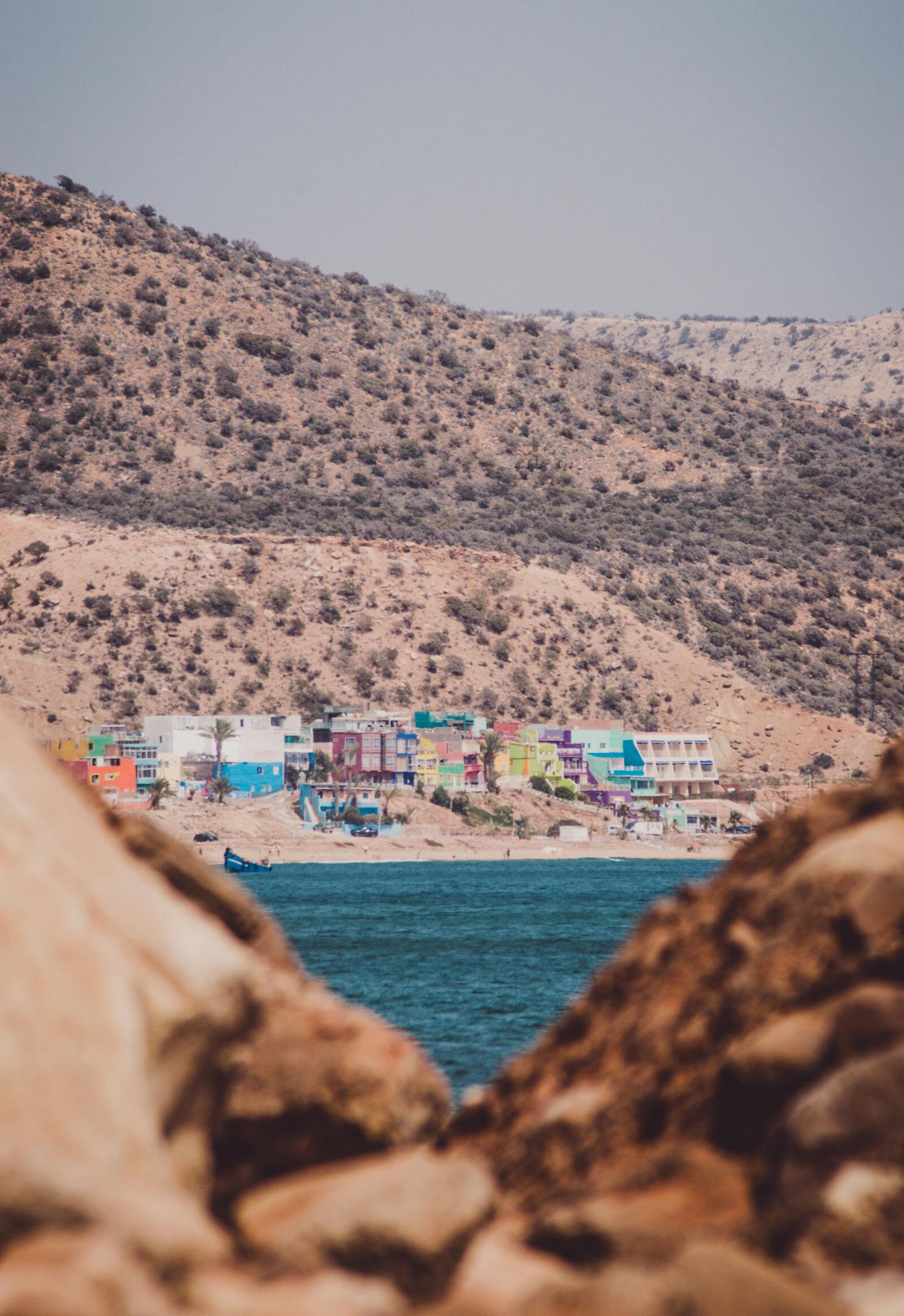 Hillside view of Taghazout village layout above the bay