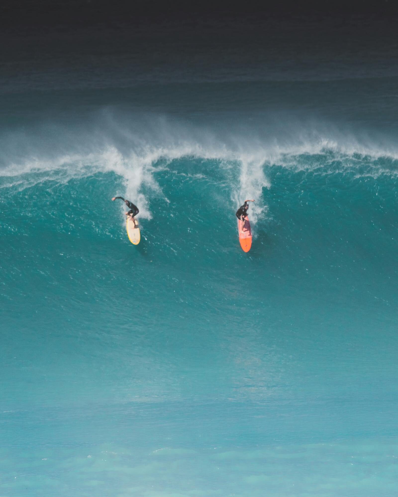Right-hand point break with surfers in the lineup at Hash Point Taghazout, Morocco